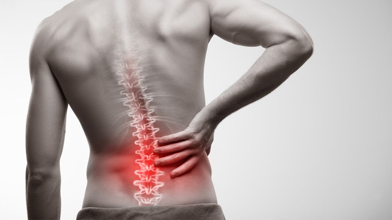 Adult holding a painful knee